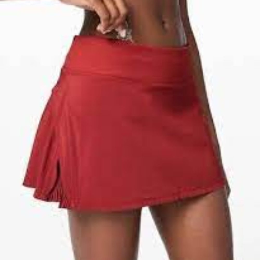 LULULEMON "PLAY OFF THE PLEATS" SKIRT IN CAYENNE COLOR